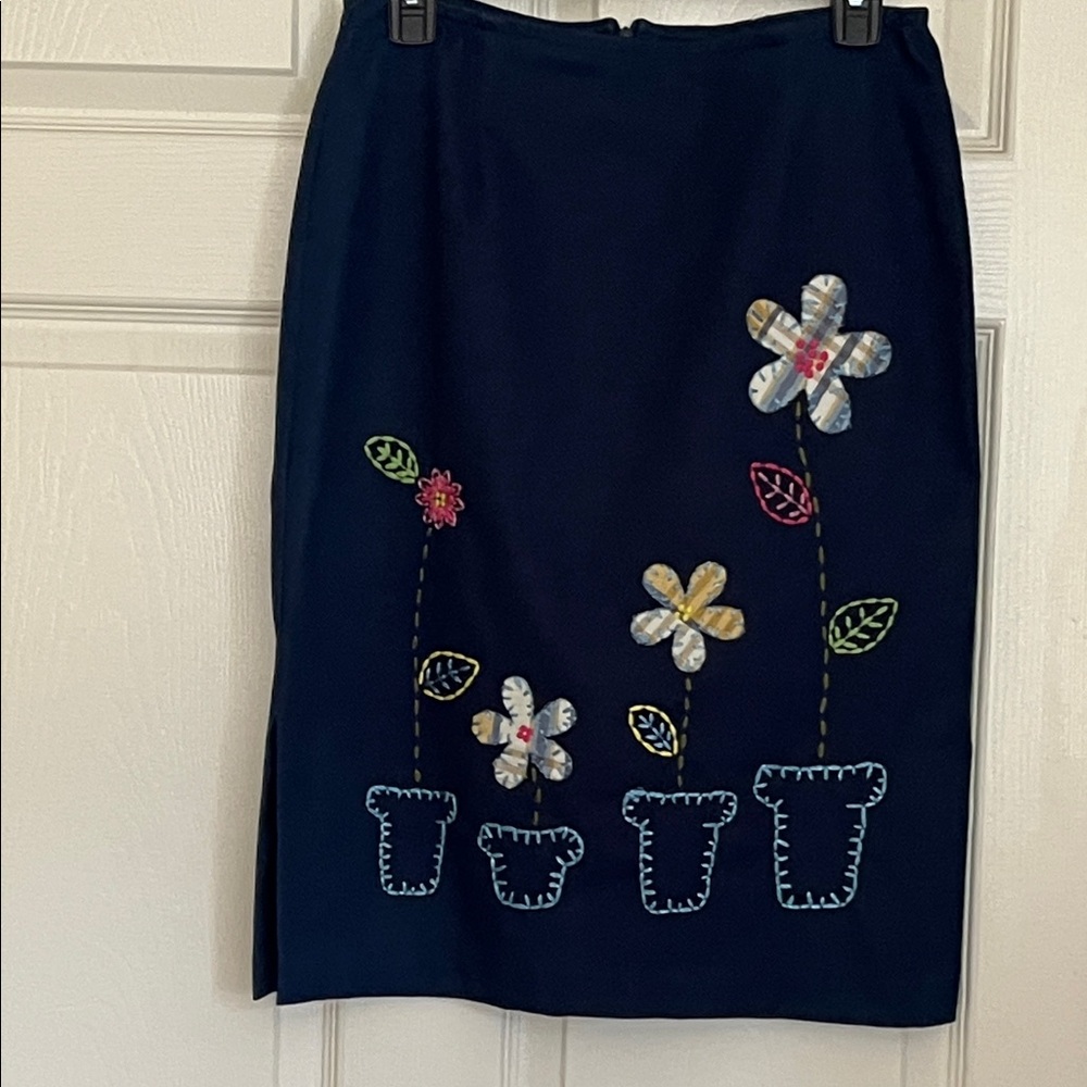 Single Navy Pencil Skirt with Floral Embroidery
Waist : 29”
Length:  241/2”